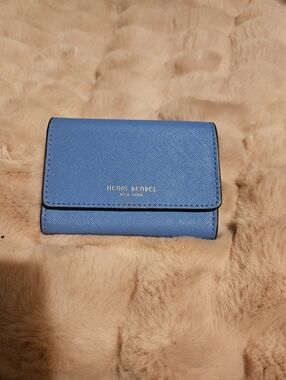 henri bendel blue leather compact trifold wallet with gold logo
